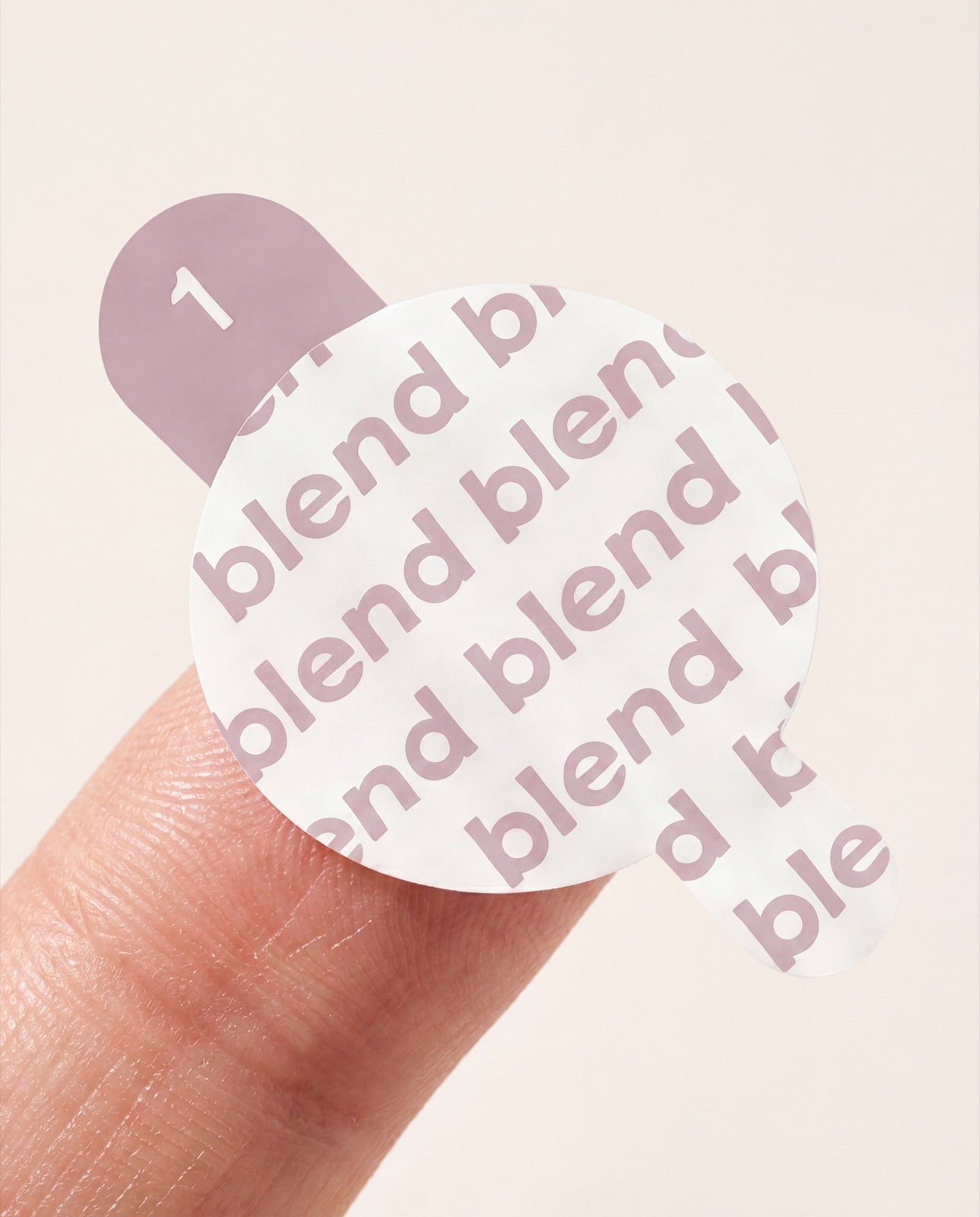 Close-up of an ultra-thin blend invisible patch on a fingertip